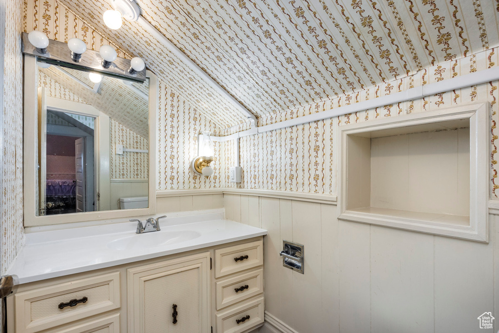 Bathroom with vanity and toilet