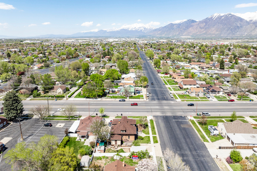 Birds eye view of property with a mountain view