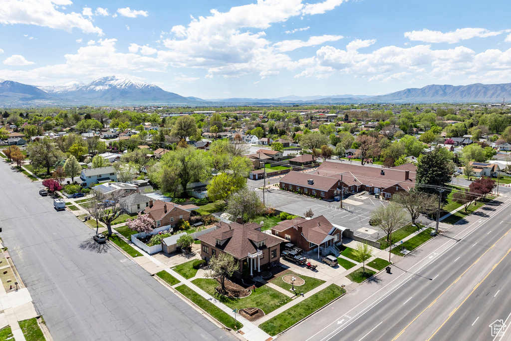 Birds eye view of property with a mountain view