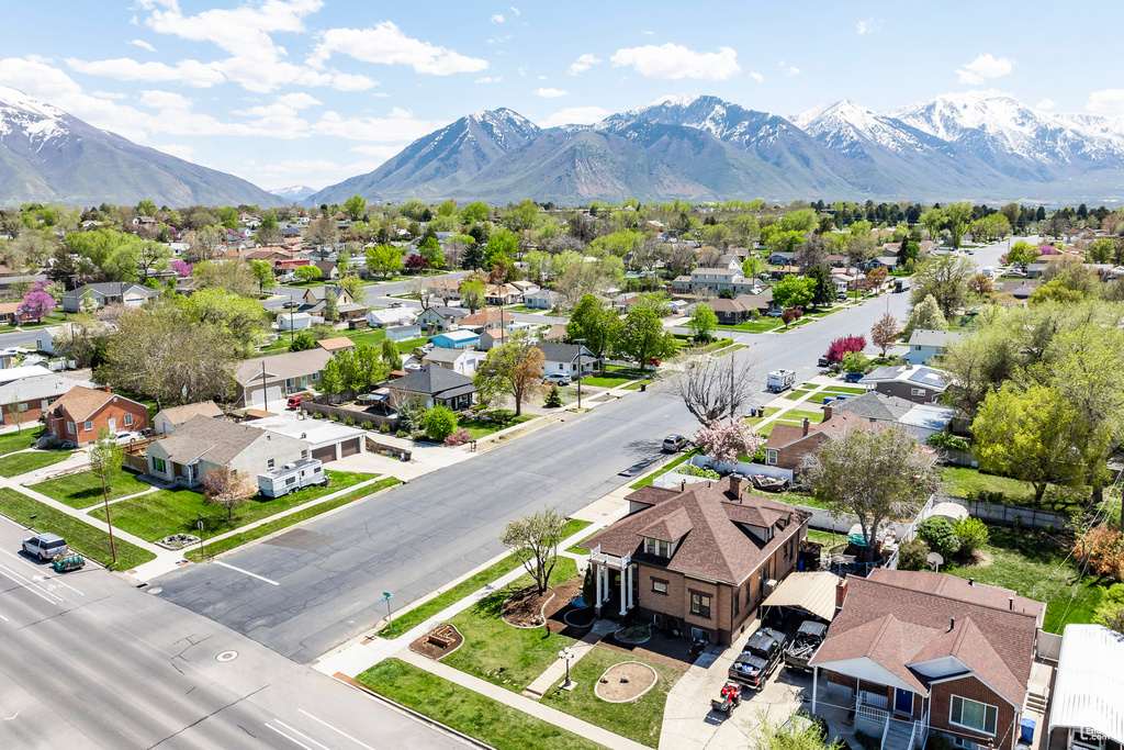 Birds eye view of property with a mountain view