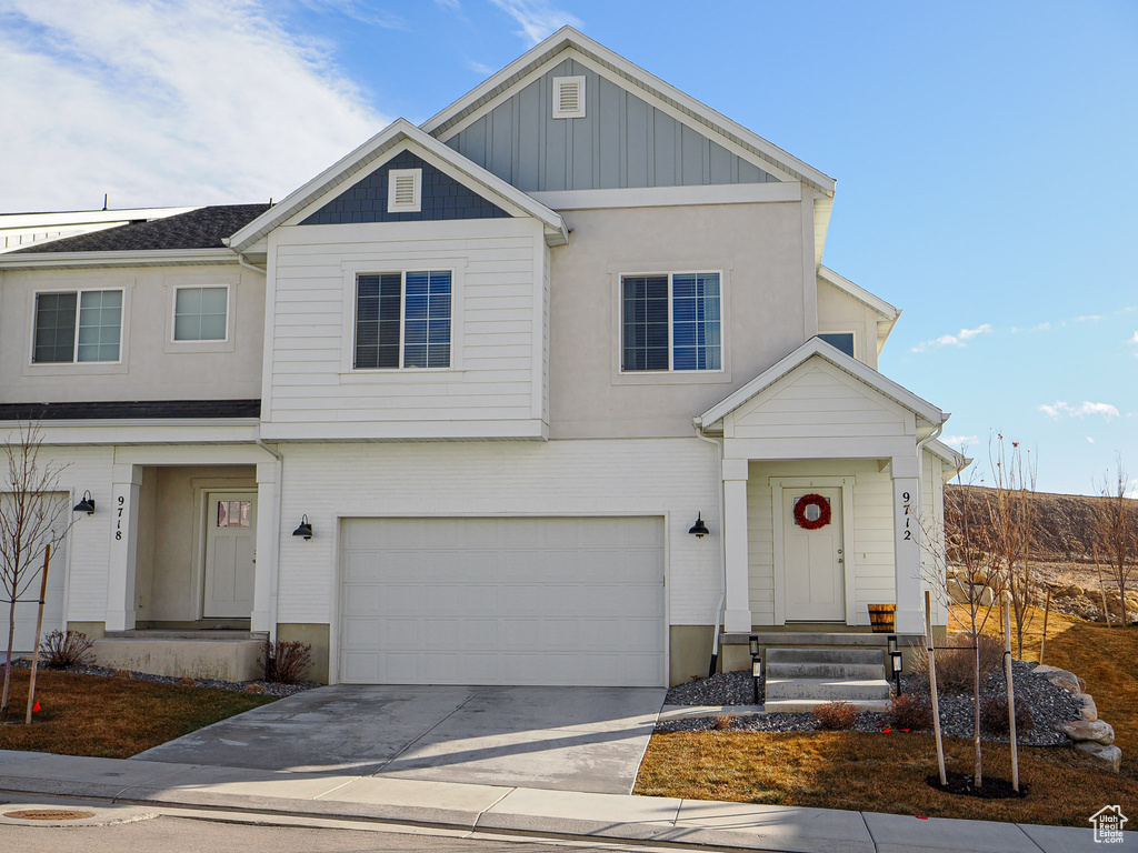 View of front of home with a garage