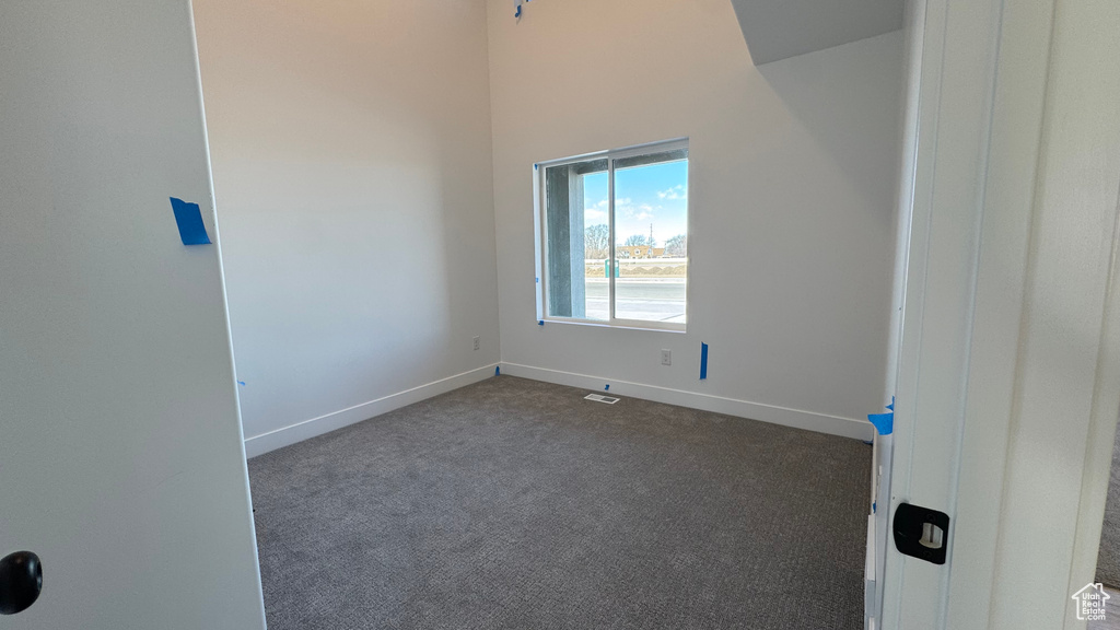 View of carpeted spare room