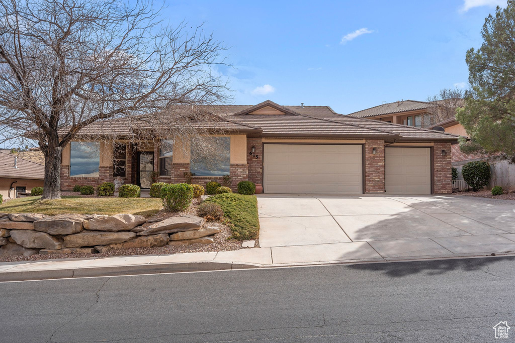 Prairie-style house with a garage