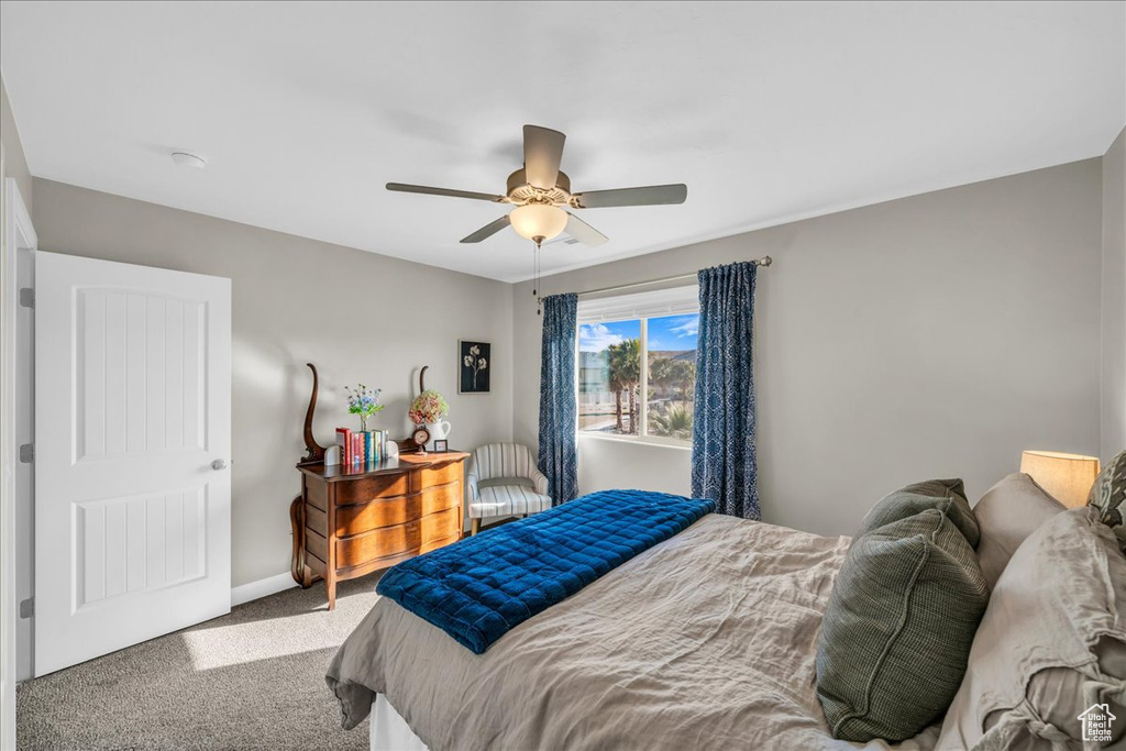 Bedroom featuring carpet floors and ceiling fan
