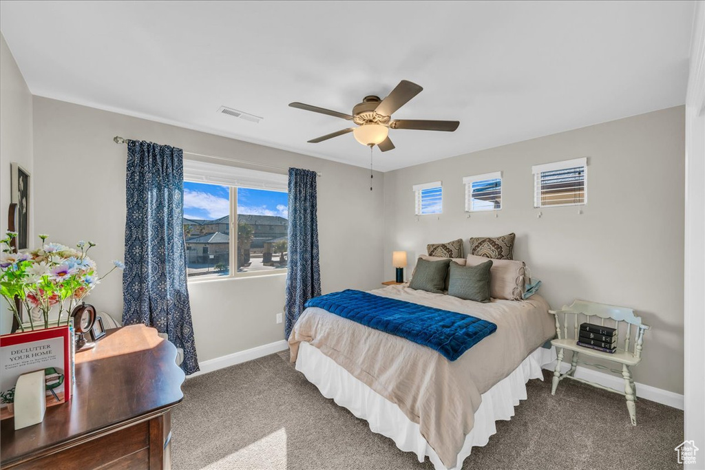 Bedroom with carpet floors and ceiling fan