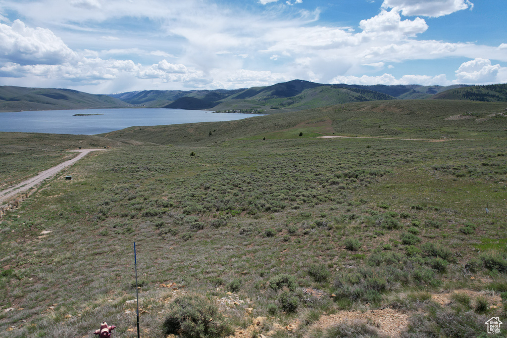 Mountain view featuring a large body of water