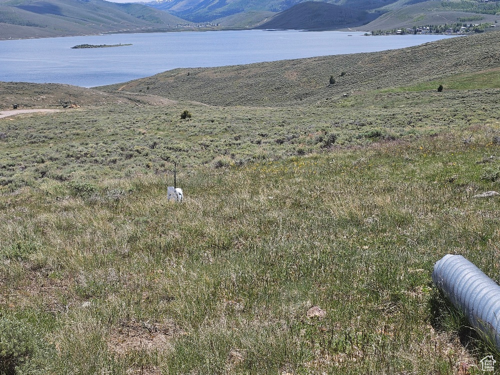 View of mountain background featuring a large body of water