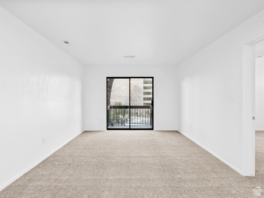 Spare room with light carpet