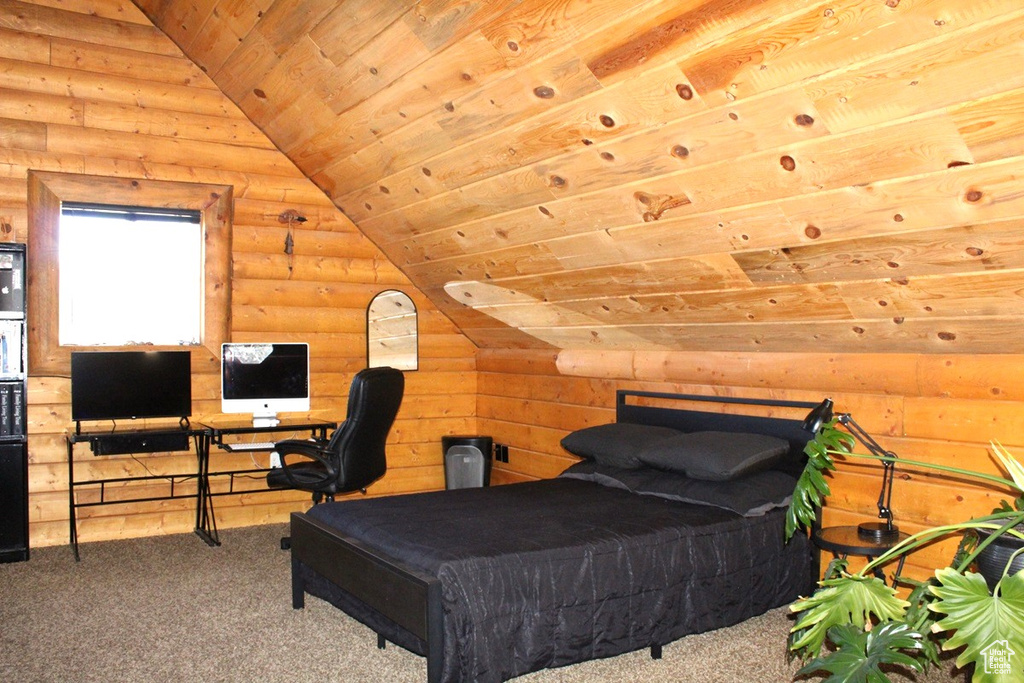 Carpeted bedroom featuring vaulted ceiling, rustic walls, and wood ceiling