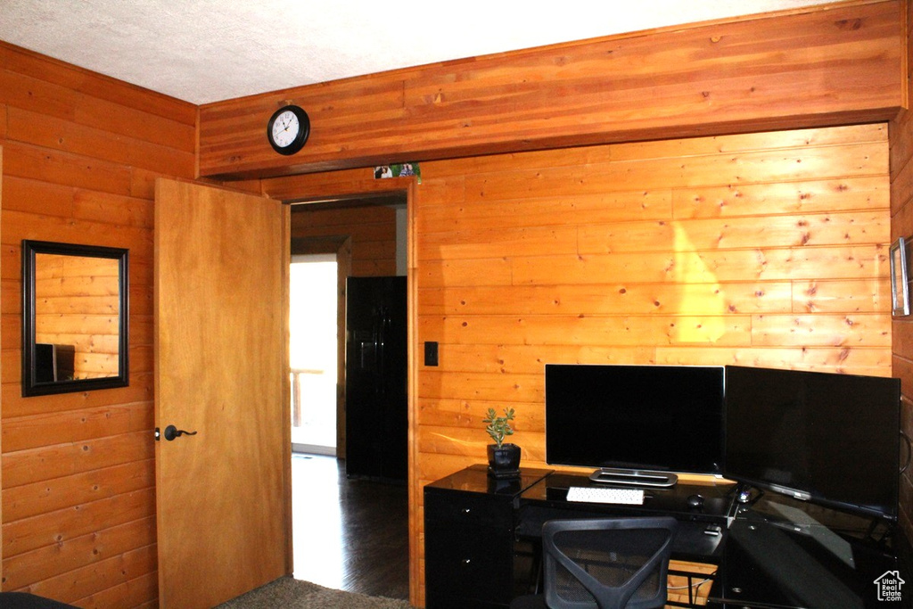 Home office with wooden walls