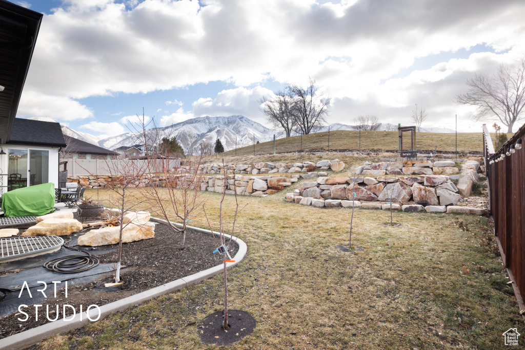 View of yard with a mountain view