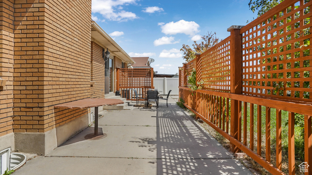 View of patio with outdoor dining space