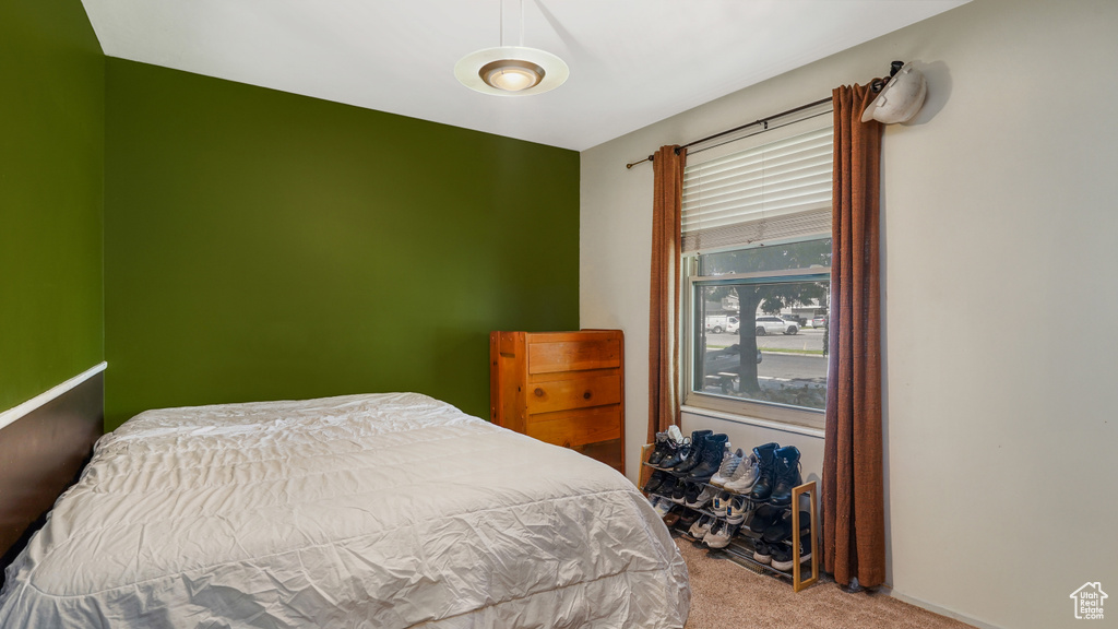 Bedroom featuring carpet