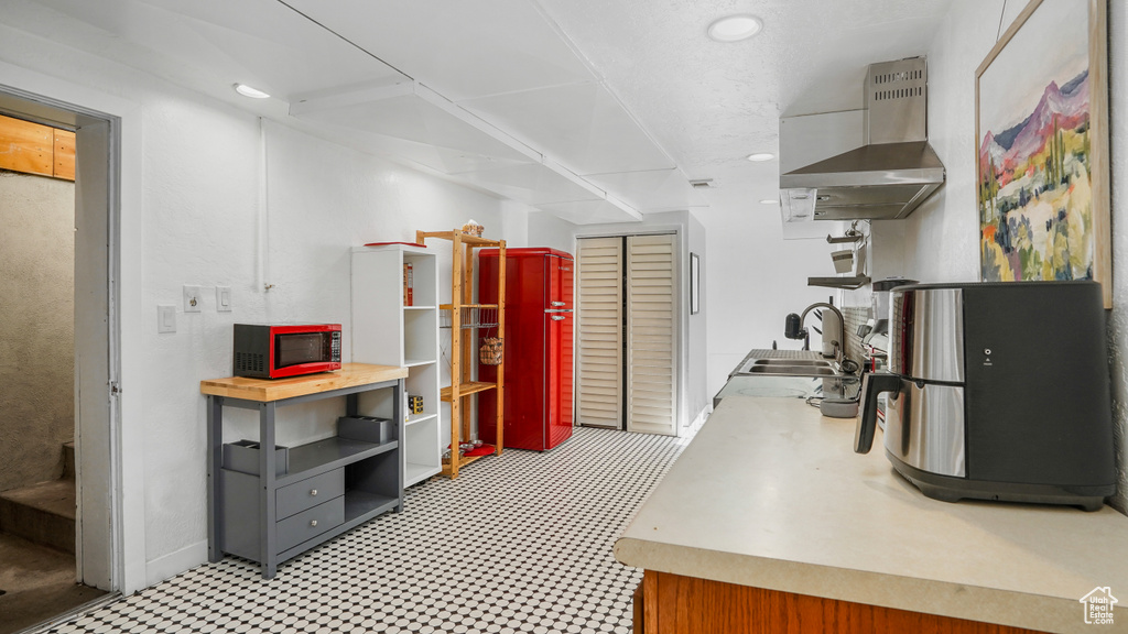Basement with recessed lighting and light floors