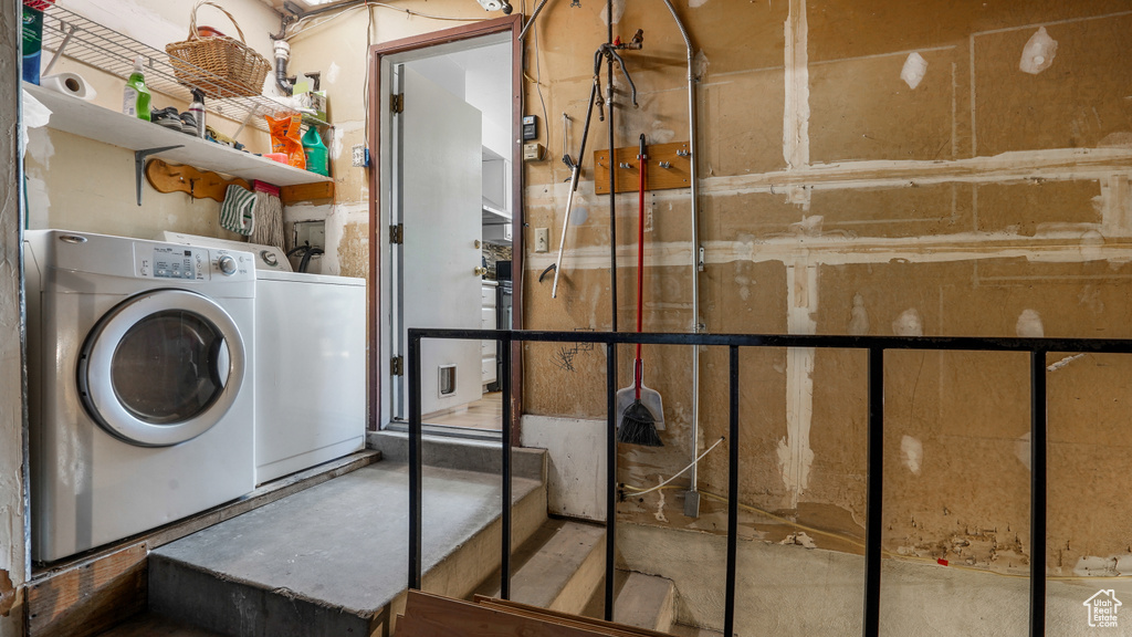 Laundry room with washing machine and dryer