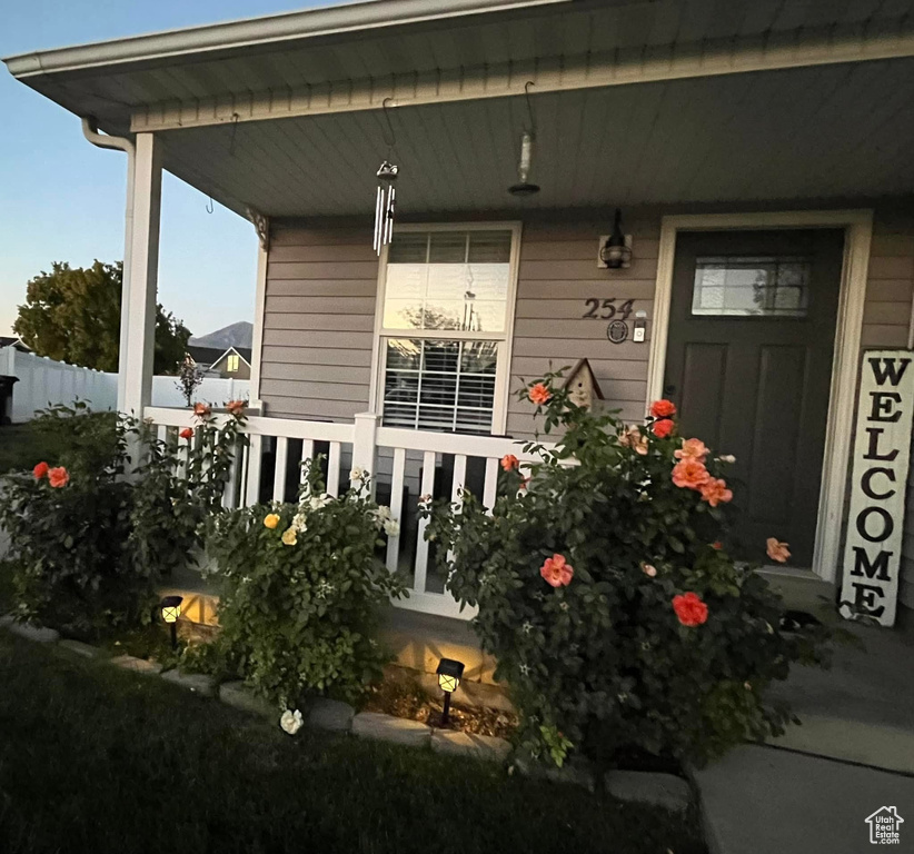 Doorway to property with a porch