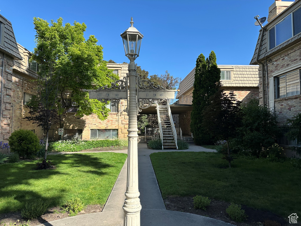 View of property with stairway