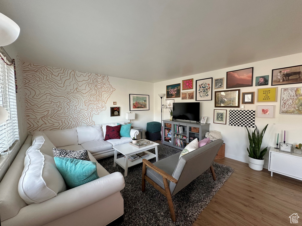 Living room with hardwood / wood-style floors