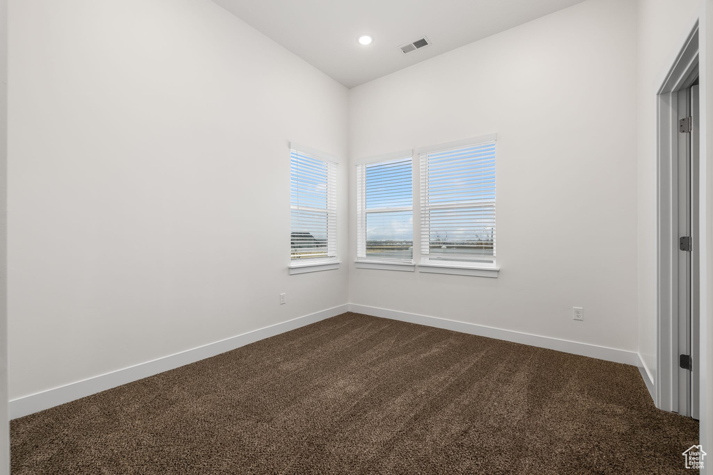 Unfurnished bedroom with carpet floors