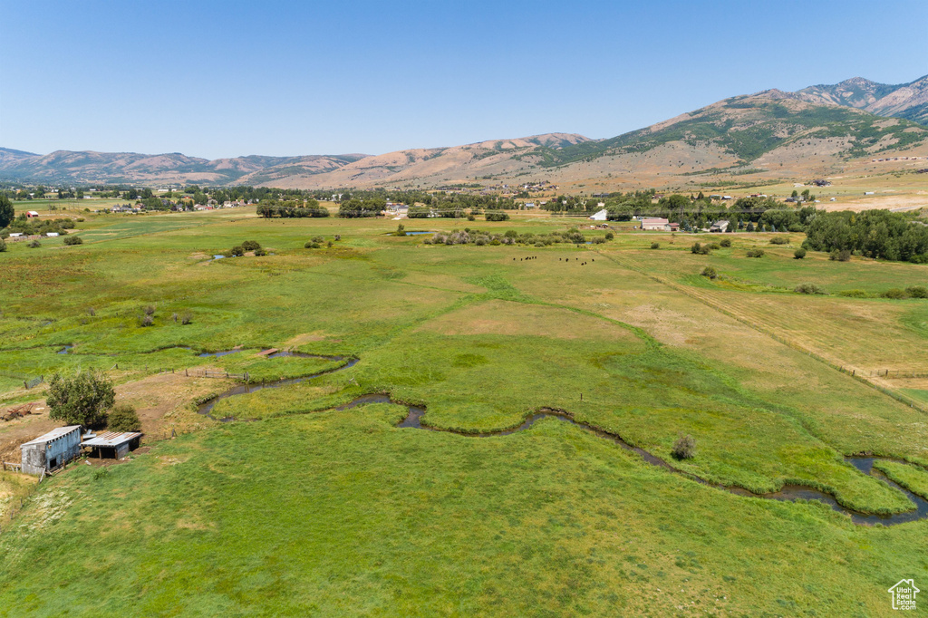 Drone / aerial view with a mountain view and a rural view