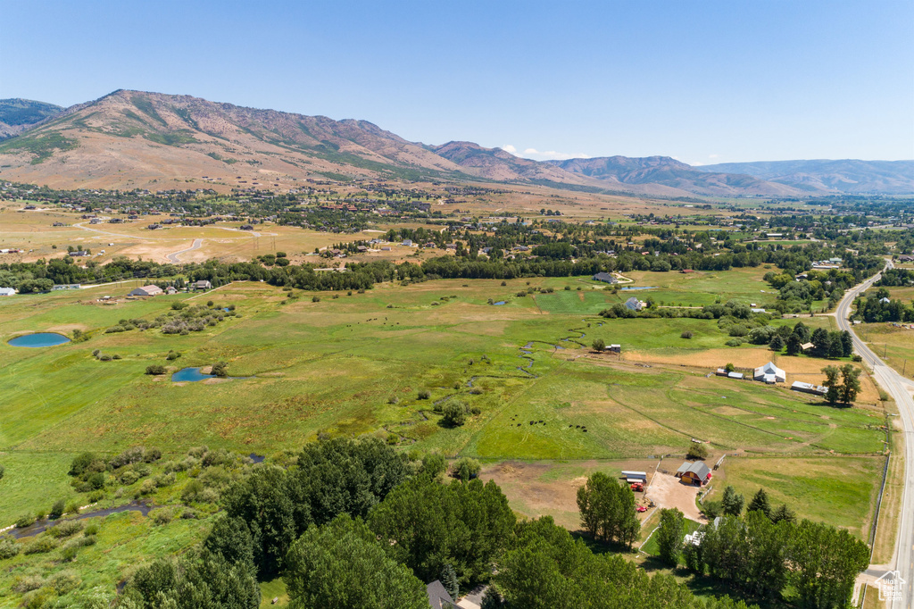 Drone / aerial view with a rural view and a mountain view