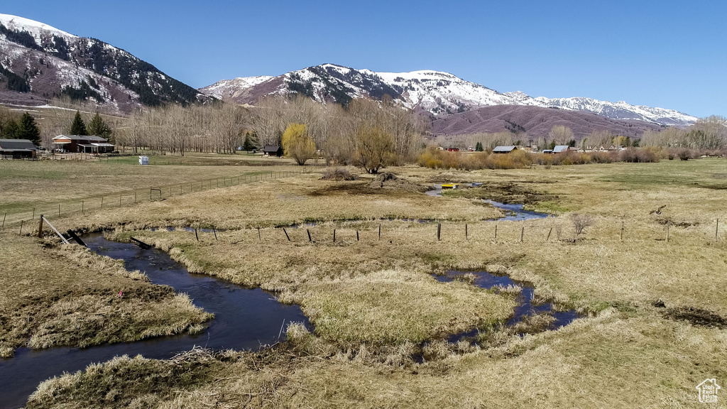 Property view of mountains featuring a rural view