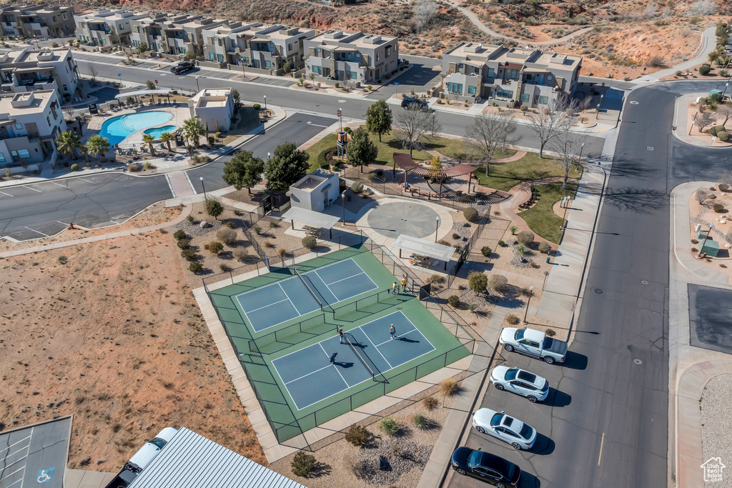 Aerial view of residential area featuring a pool