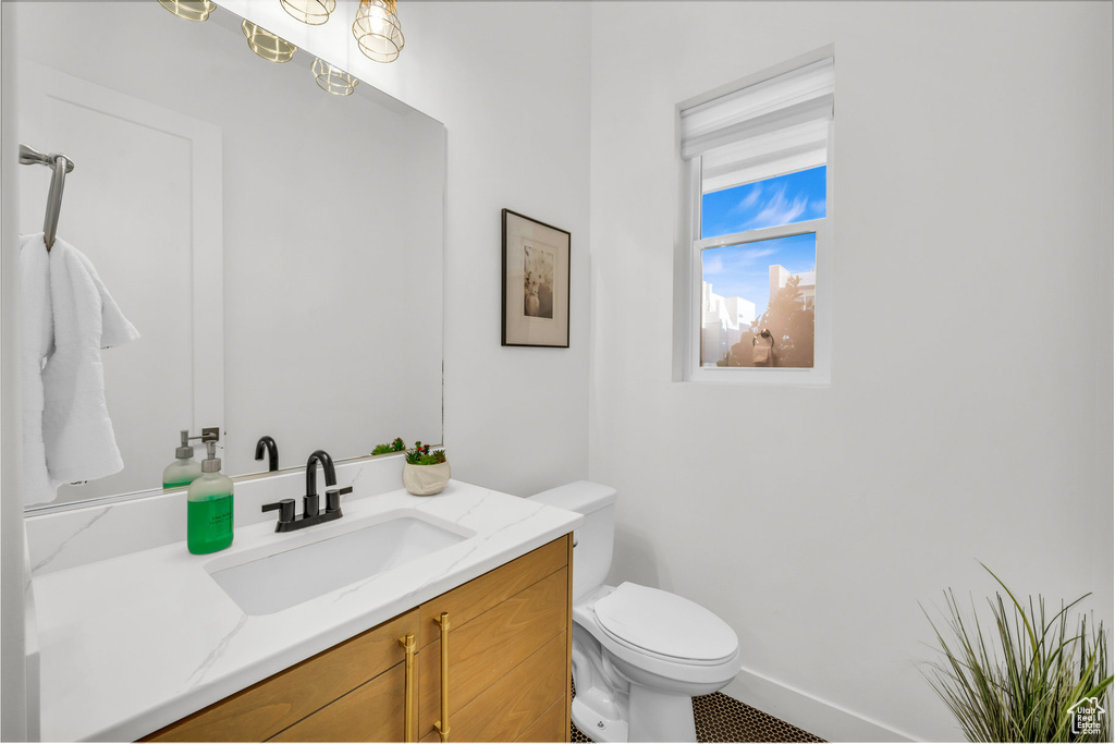 Bathroom featuring vanity and tile patterned flooring