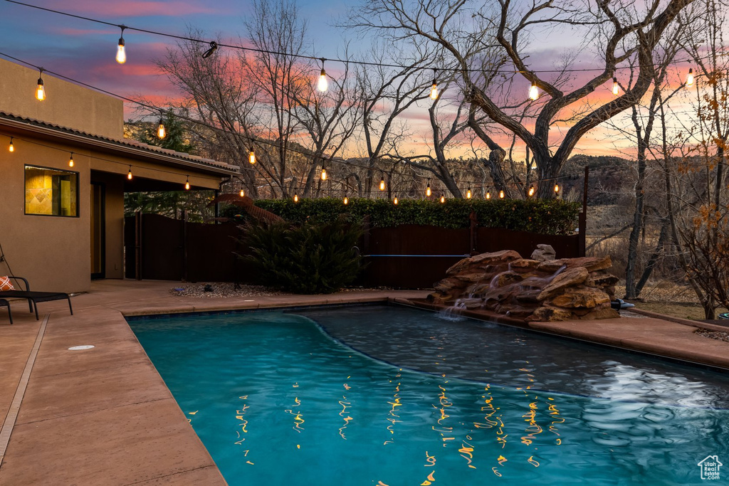 View of swimming pool with fence
