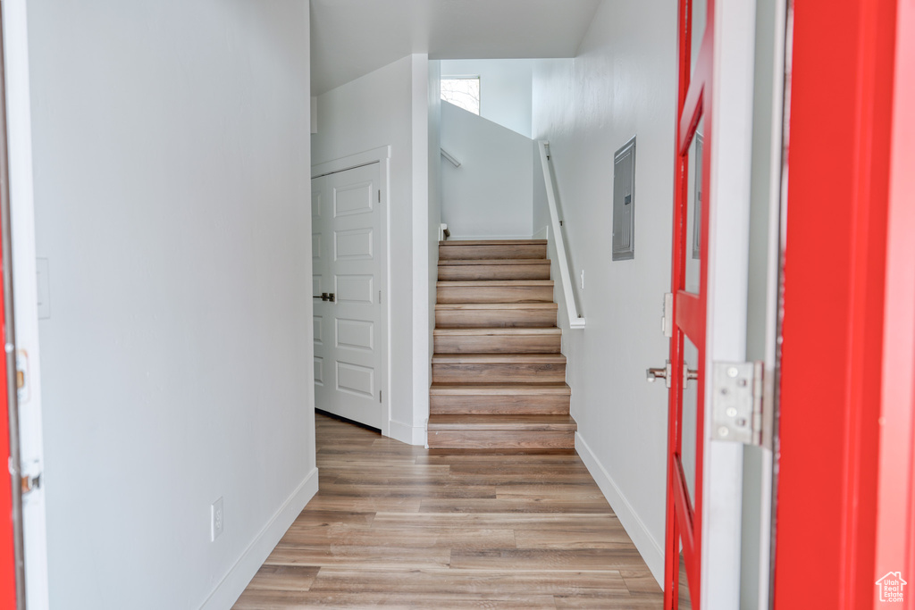 Entrance foyer featuring light hardwood / wood-style flooring and electric panel
