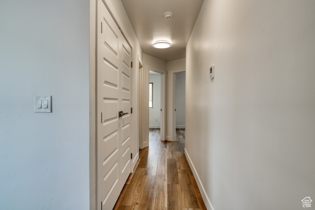 Hall with light wood-type flooring