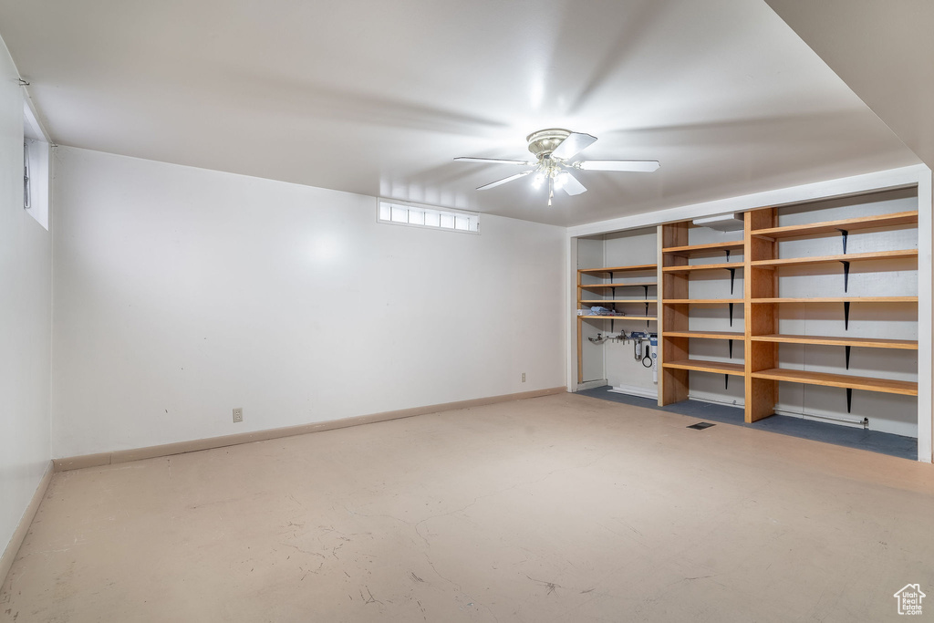 Basement with ceiling fan