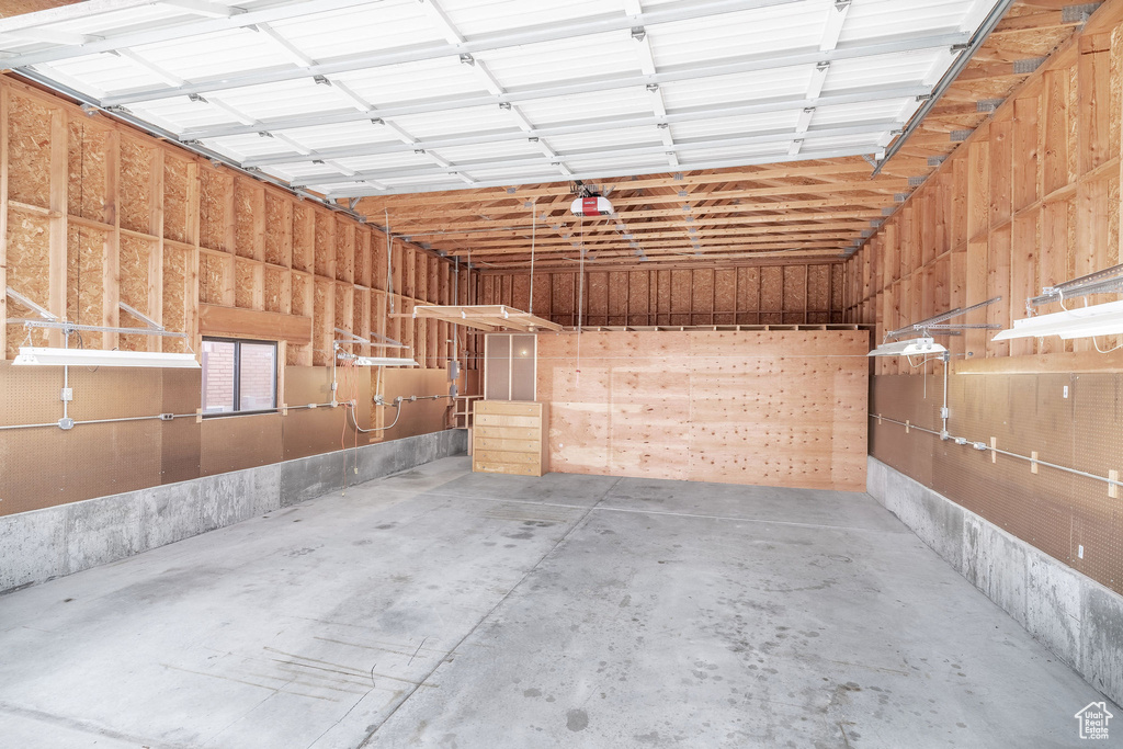 Garage featuring a garage door opener