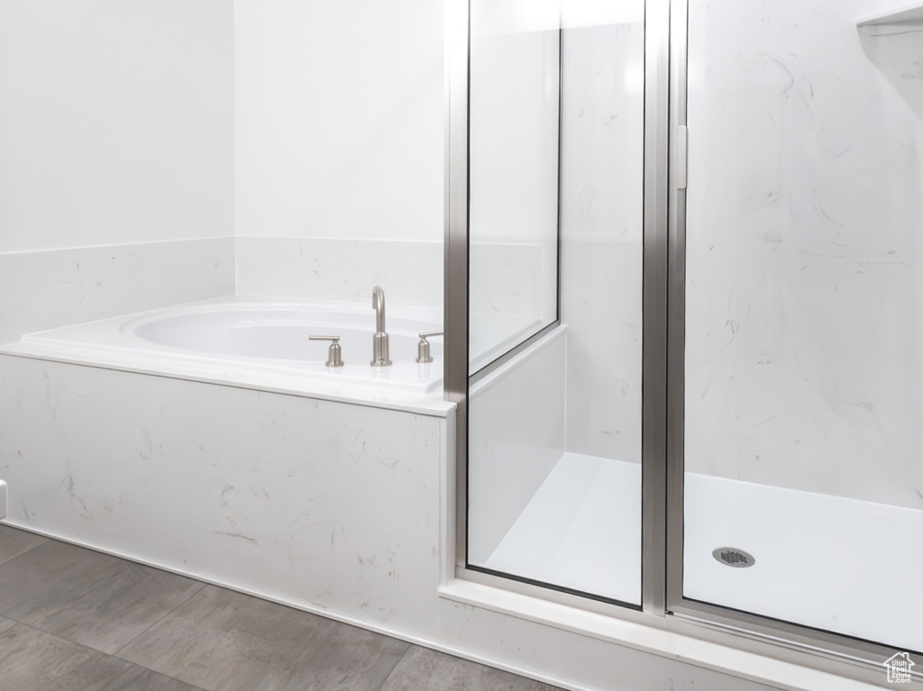 Bathroom with independent shower and bath