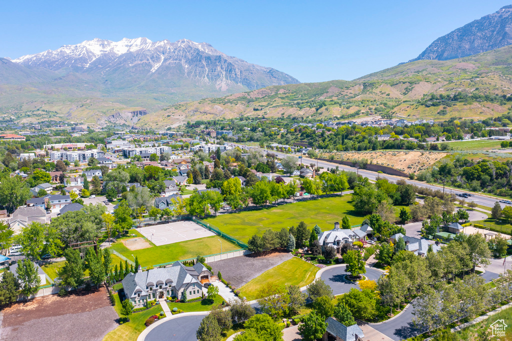 Aerial view of residential area with mountains
