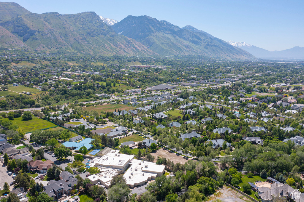 Aerial view of residential area with a mountain backdrop