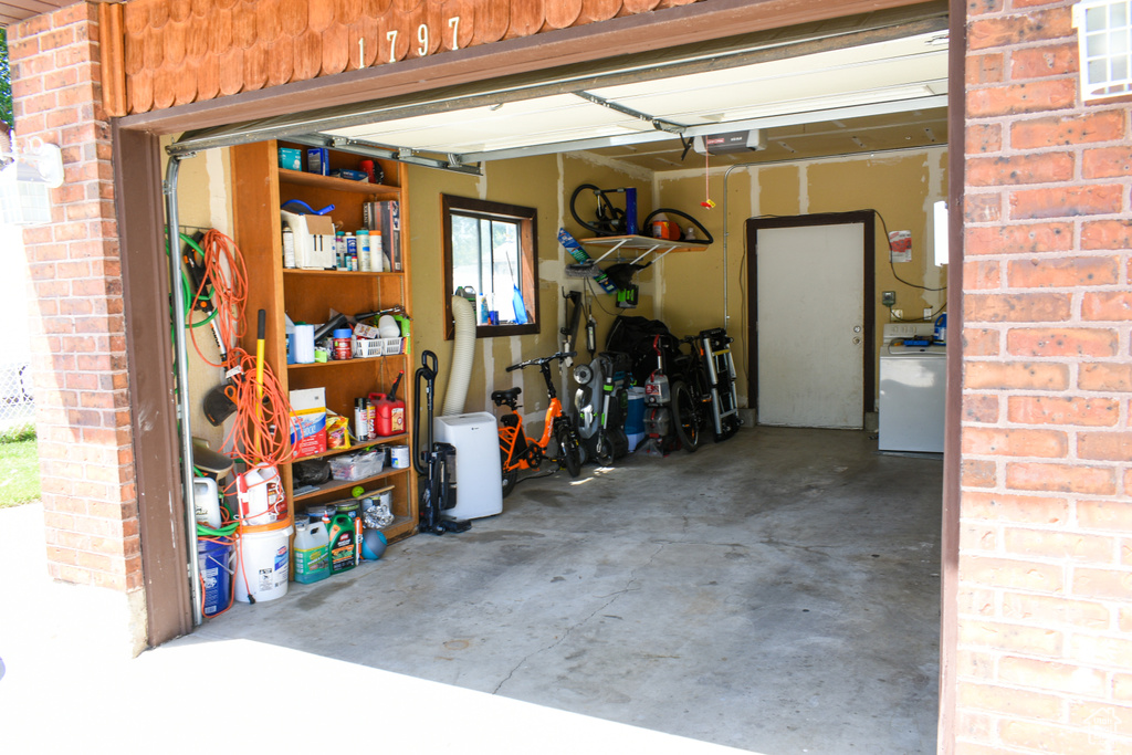 Garage featuring a garage door opener