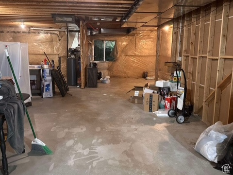 Basement featuring water heater