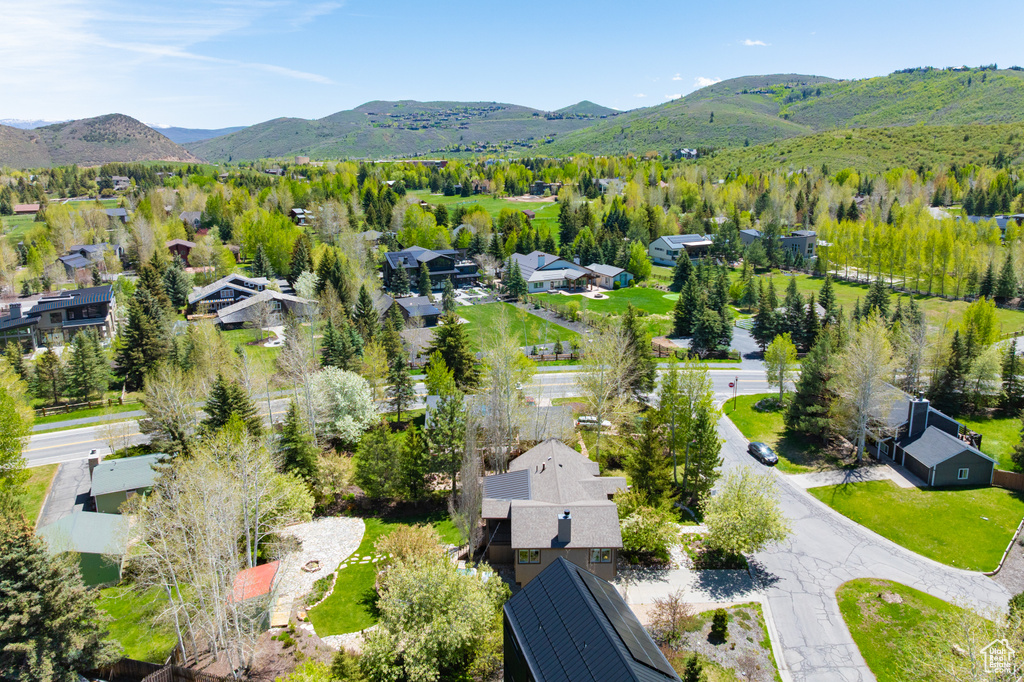 Aerial view of residential area with a mountainous background
