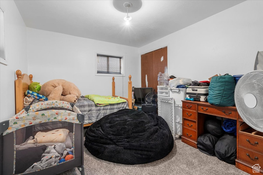 Bedroom with carpet