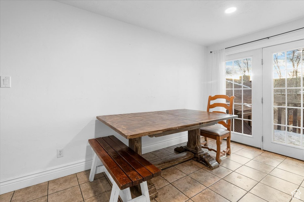 Dining room featuring light tile patterned floors