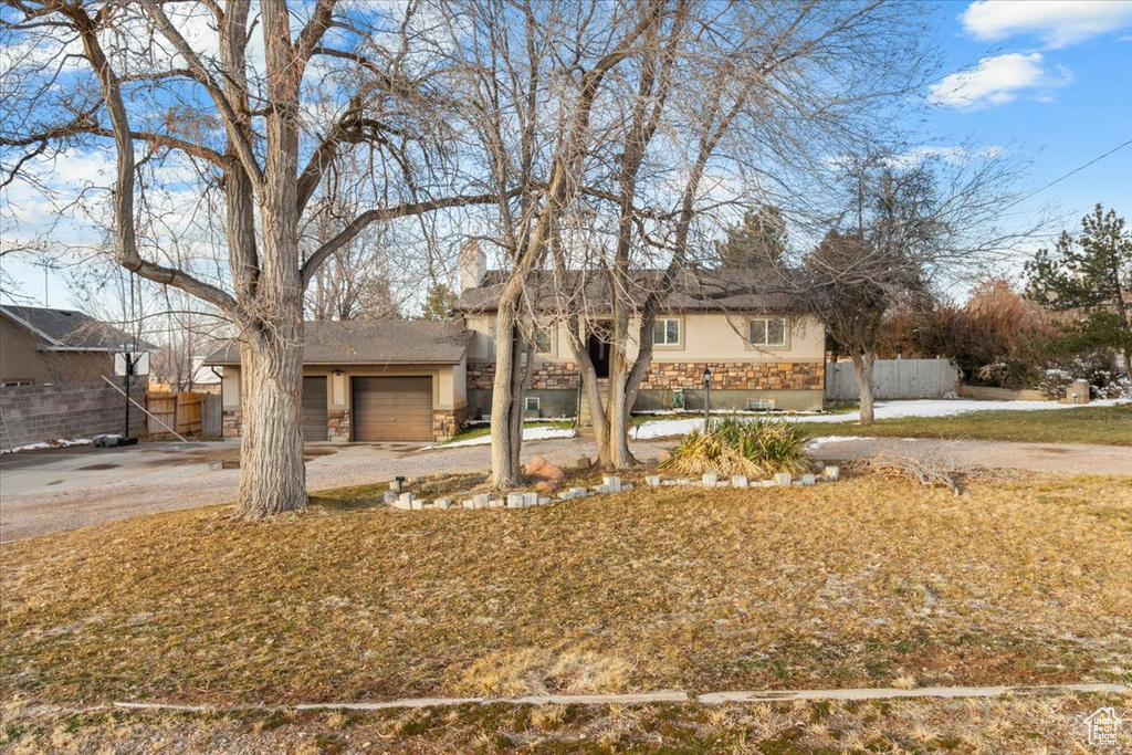 View of front of home with a garage