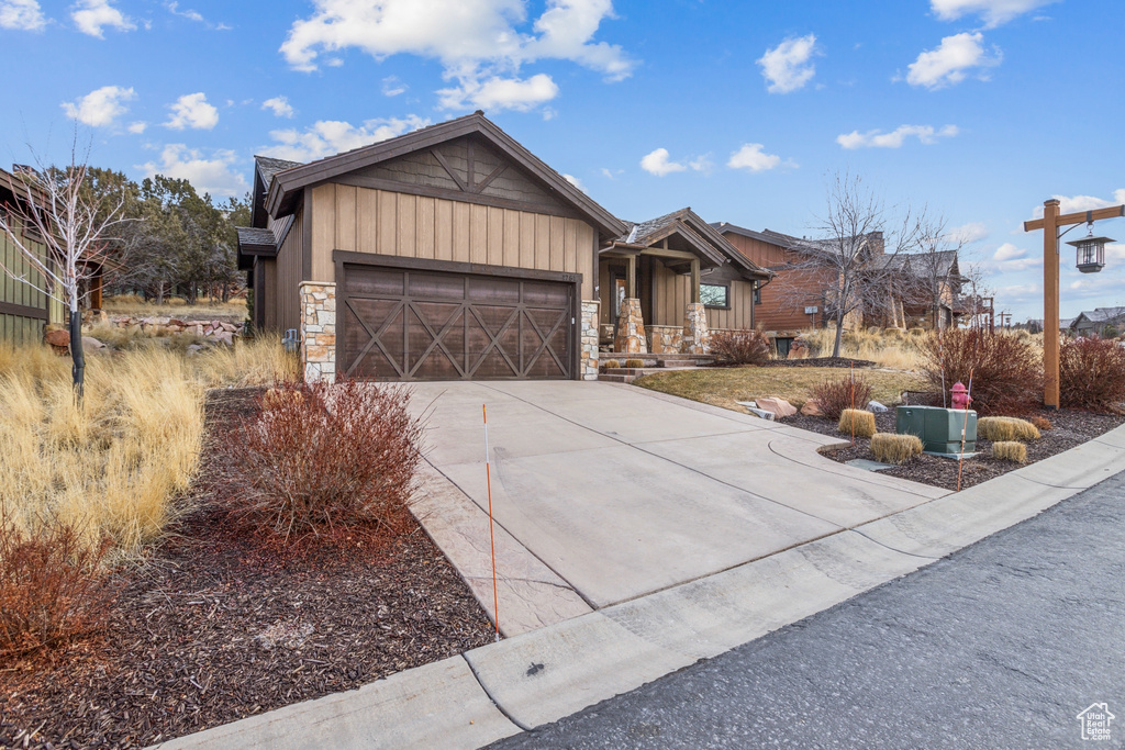 View of front of home featuring a garage