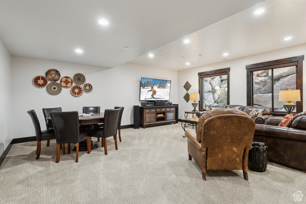 Living room featuring light colored carpet