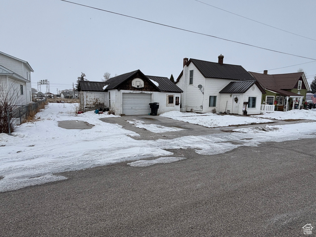 View of front of property with a garage