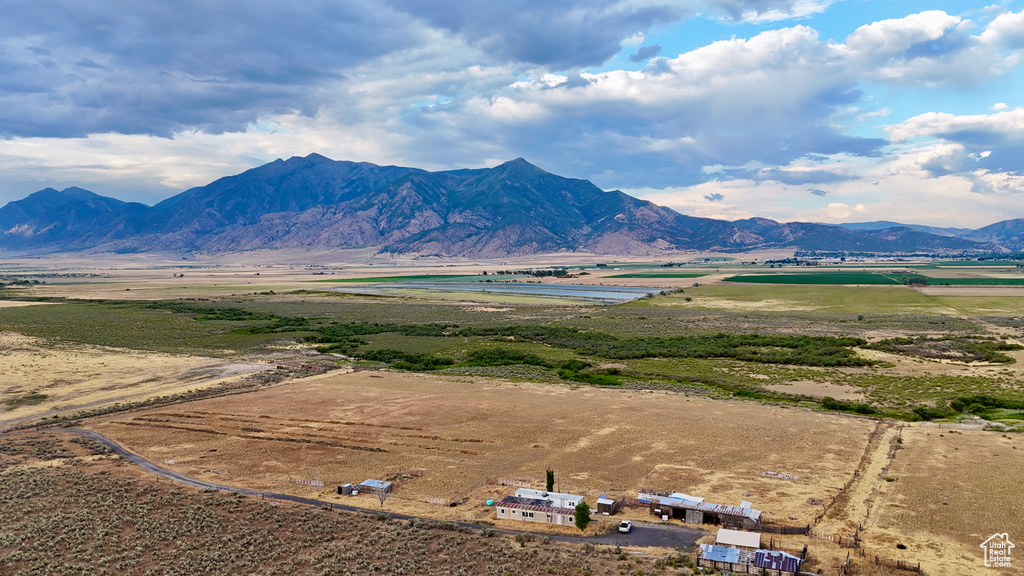 Property view of mountains with a rural view