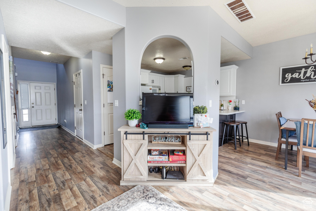 Living room featuring dark wood-type flooring