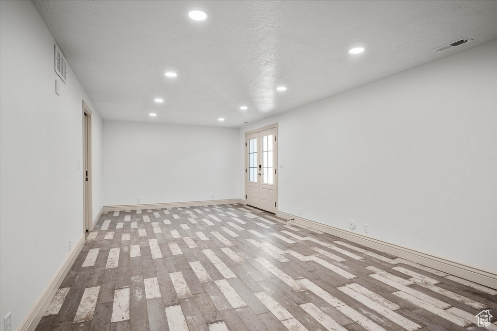 Spare room featuring light hardwood / wood-style floors