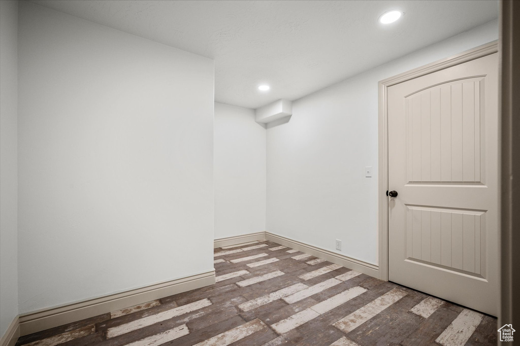 Unfurnished room with hardwood / wood-style floors