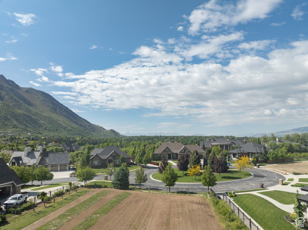 View of mountain backdrop with nearby suburban area